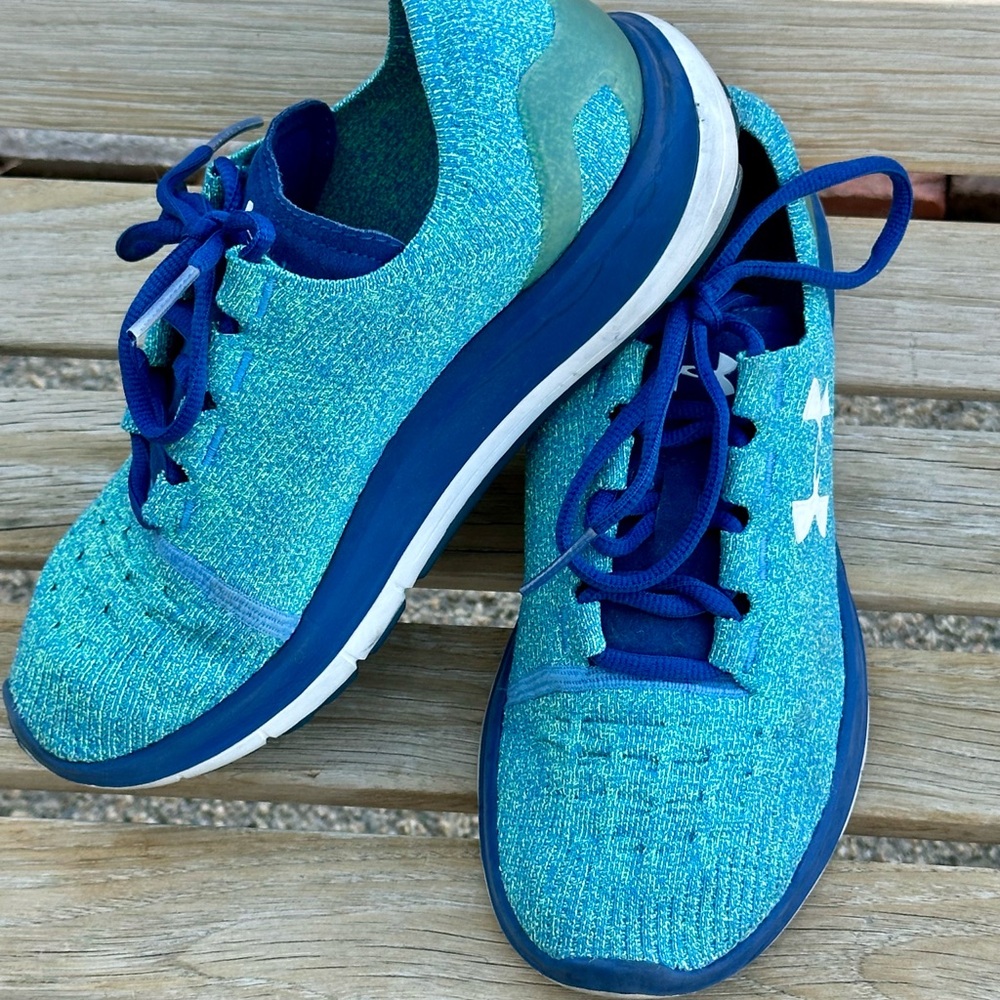 1 pair Under Armour Woman’s Teal Sneakers Tennis Shoes Size 7.5-8 Teal only.